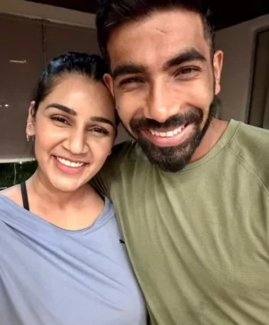 jasprit bumrah with his wife
