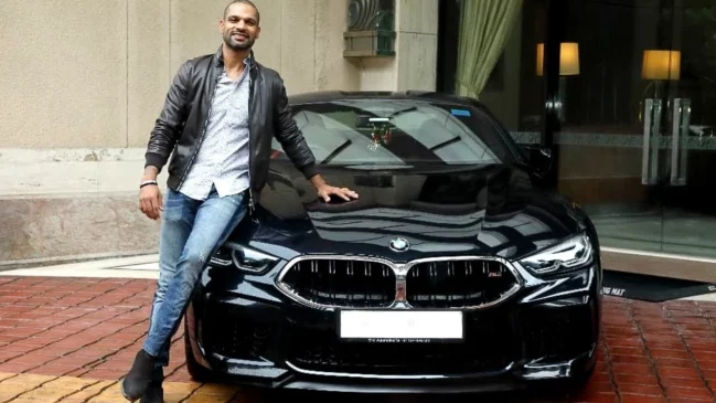 shikhar dhawan with his car